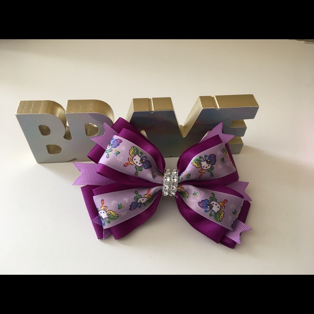 Purple Hello Kitty bow🎀